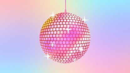 A pink disco ball on a colorful background