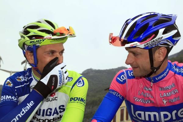 Ivan Basso (Liquigas-Cannondale) shares a joke with Michele Scarponi (Lampre-ISD).