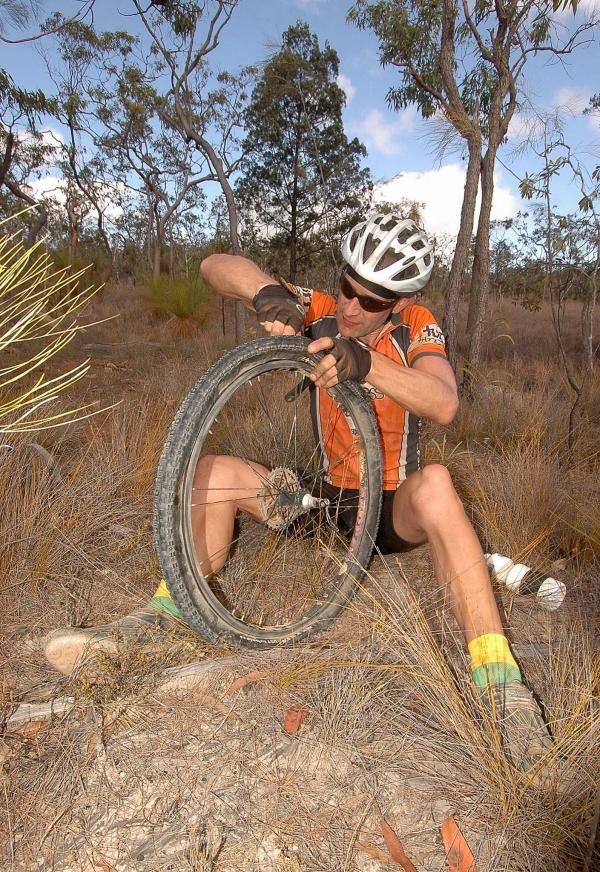 Aaron Pickett-Heaps changes a flat tyre