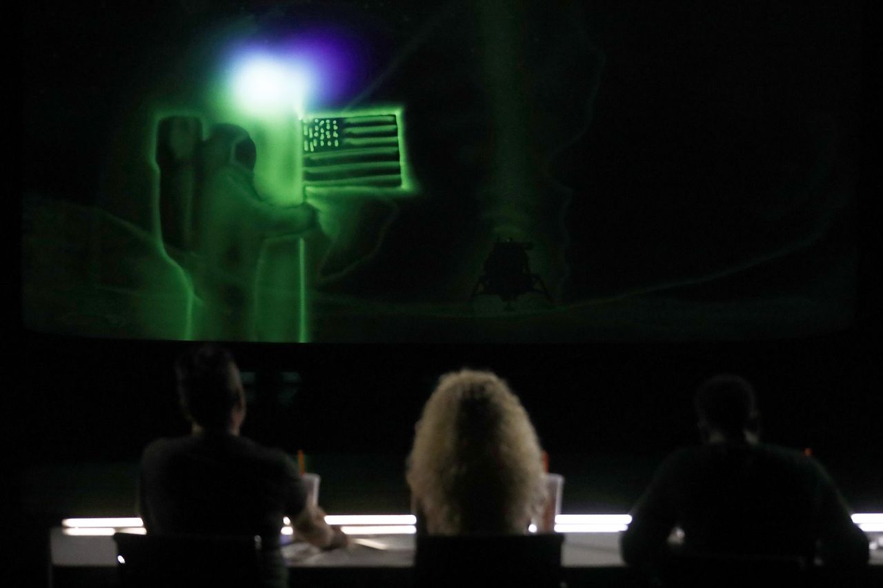 The Apollo 11 moon landing takes the stage on NBC's "America's Got Talent" Tuesday, July 23, in a must-see performance by Light Art Show's light projection artist Alex Dowis.