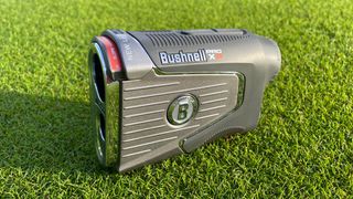 Bushnell Pro X3 Golf Rangefinder lying on the grass
