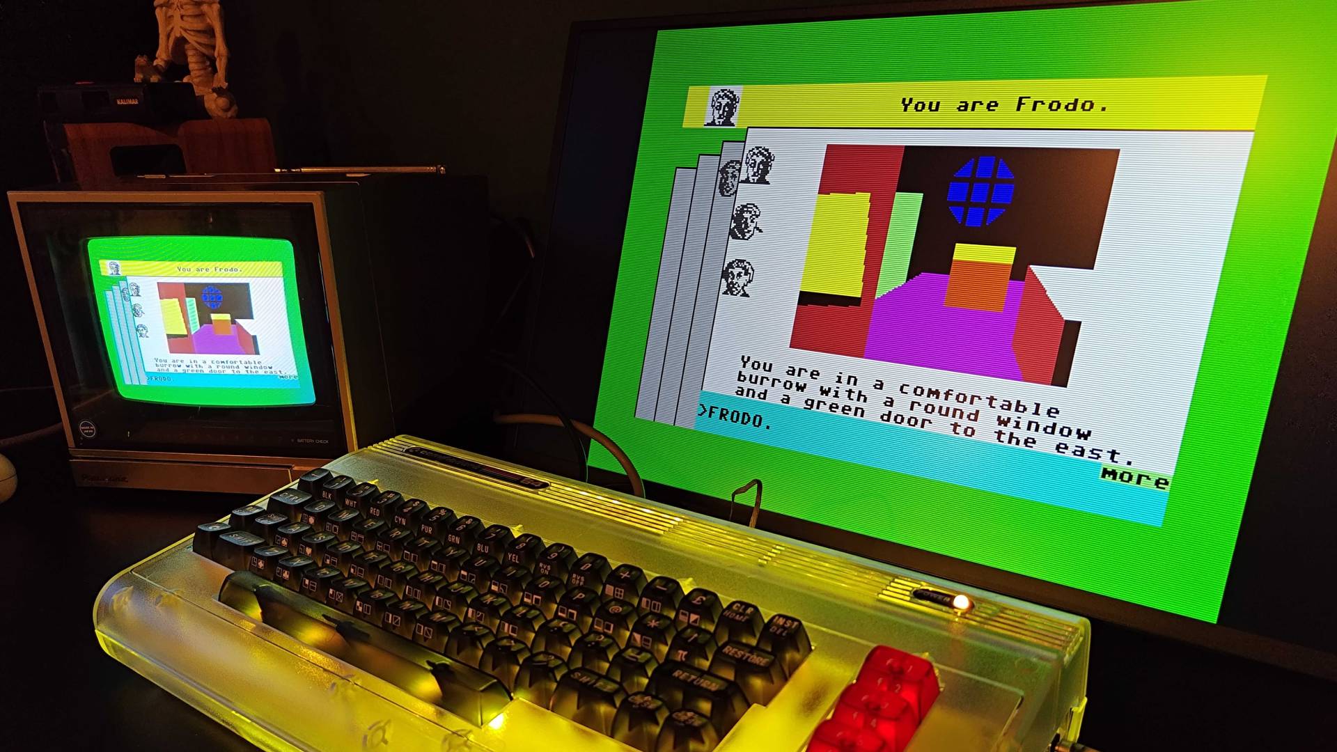 Commodore 64 Ultimate Startlight with yellow RGB lighting with The Lord of the Rings C64 game running on monitor and CRT TV.