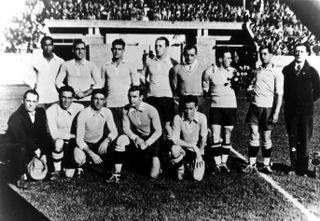 Jose Leandro Andrade (top left) with the Uruguay football team at the 1928 Olympic Games in Amsterdam.