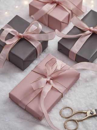 Christmas wrapping in pink and grey