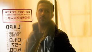 Ryan Gosling stands in a crime scene in Blade Runner 2049