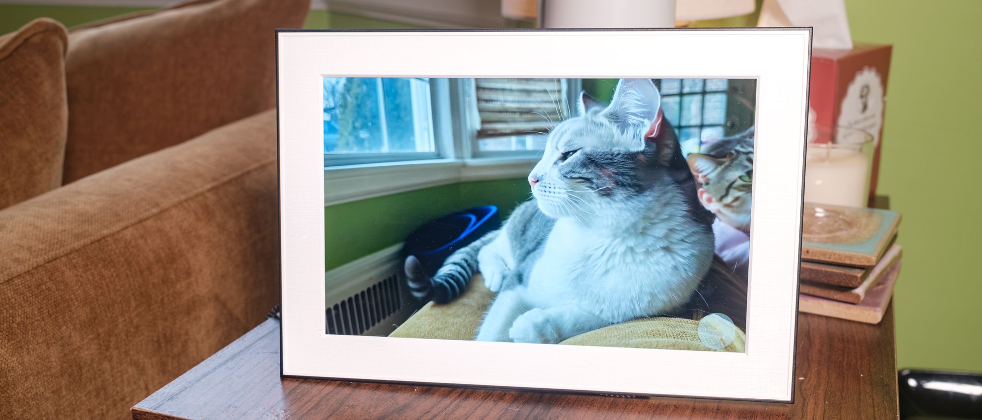 من یک قاب عکس را آزمایش کردم که تصاویر شما را مانند هری پاتر متحرک می کند و تقریباً جادویی است