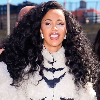 Cardi B was spotted in NYC wearing black leggings with pointy pumps