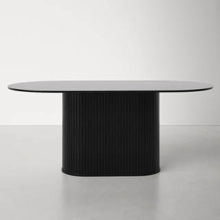 Black modern pedestal dining table.