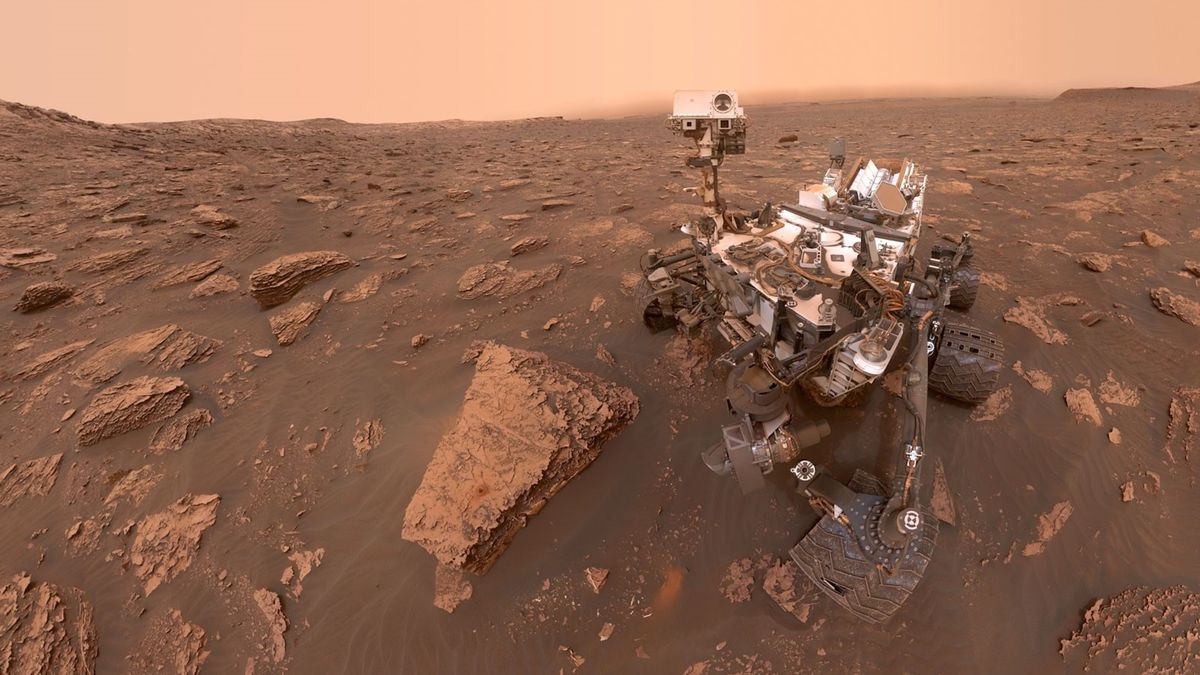 a photo of a rover on the surface of Mars