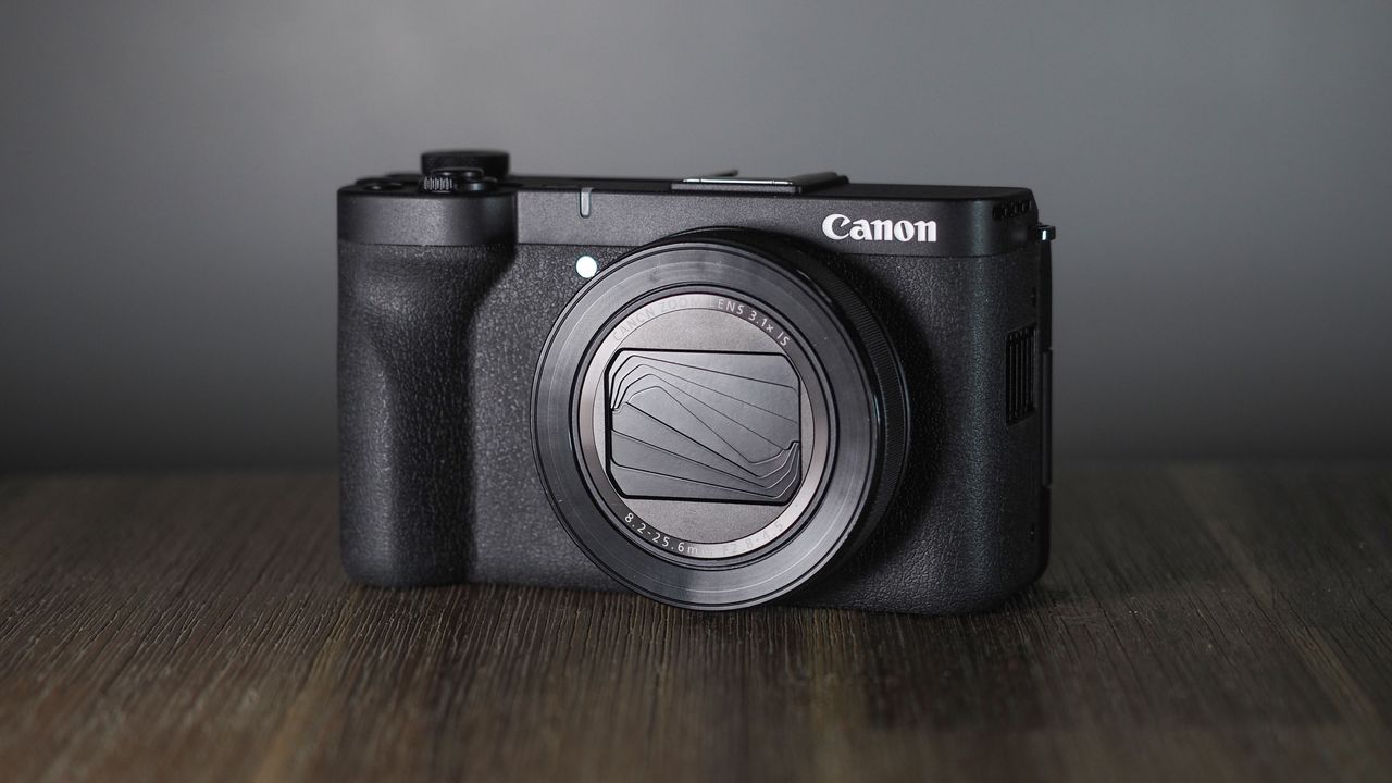 Canon PowerShot V1 on a wooden surface