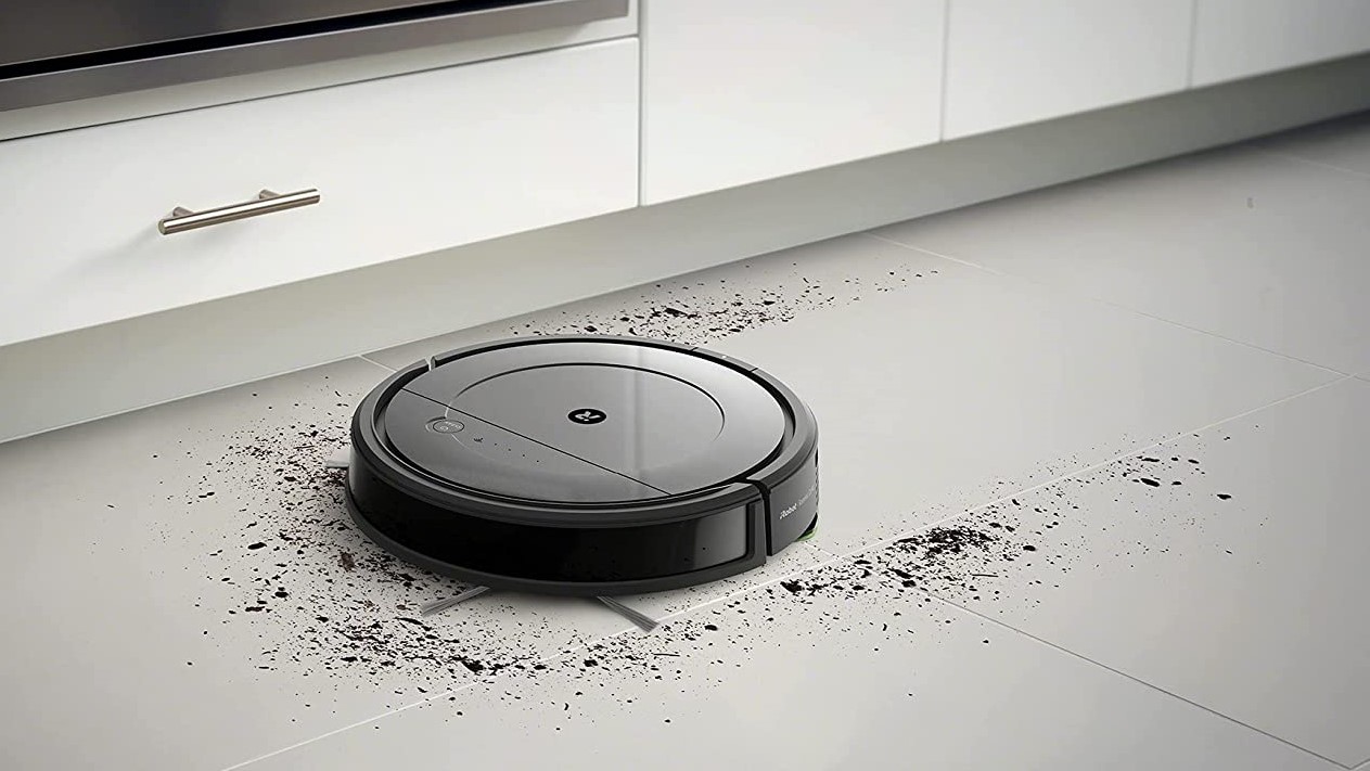 iRobot Roomba Combo cleaning a spill on a kitchen floor