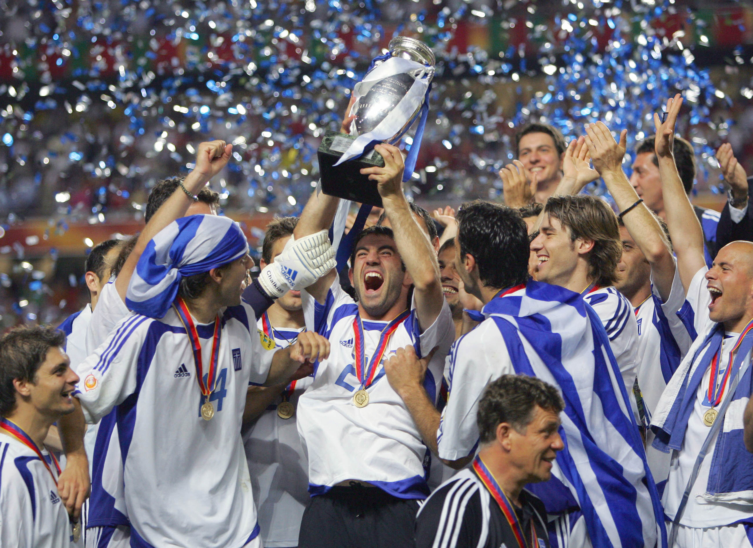 Greece players celebrate their Euro 2004 final win against Portugal in July 2004.