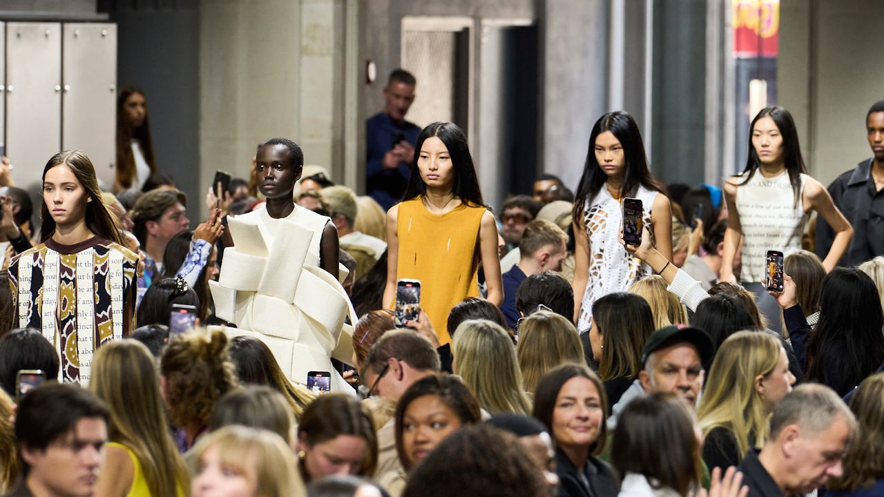 a group of models walking the JW Anderson runway at london fashion week