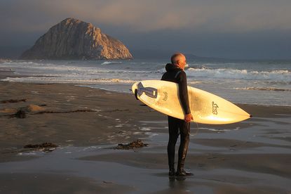 A surfer in Morro Bay, California.