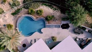 Brian Ray's Les Paul-shaped swimming pool