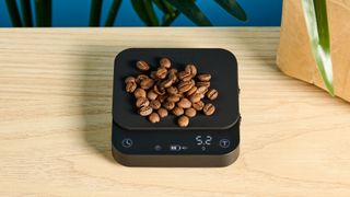 A black Wacaco Exagram Pro coffee scale