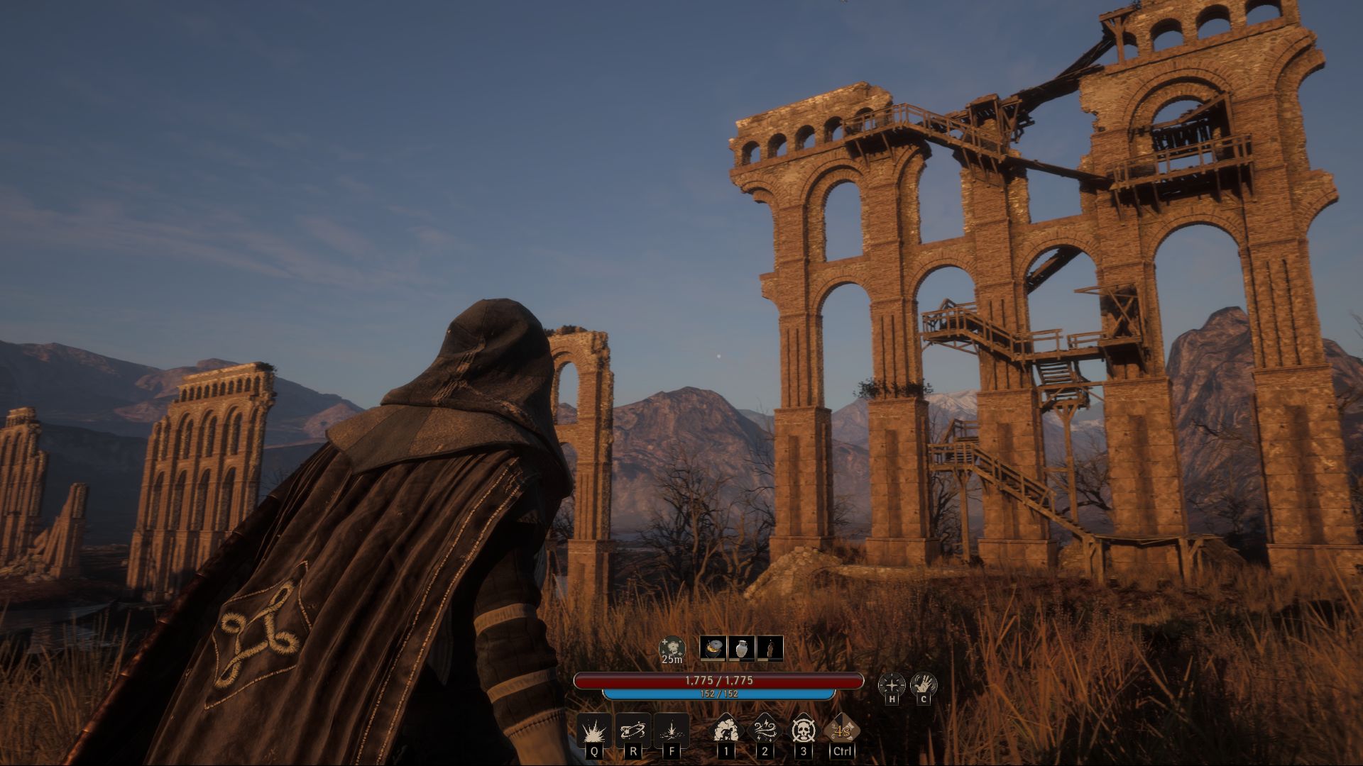 An adventurer in Pax Dei wearing a hood and looking across an open field at towering ruins.
