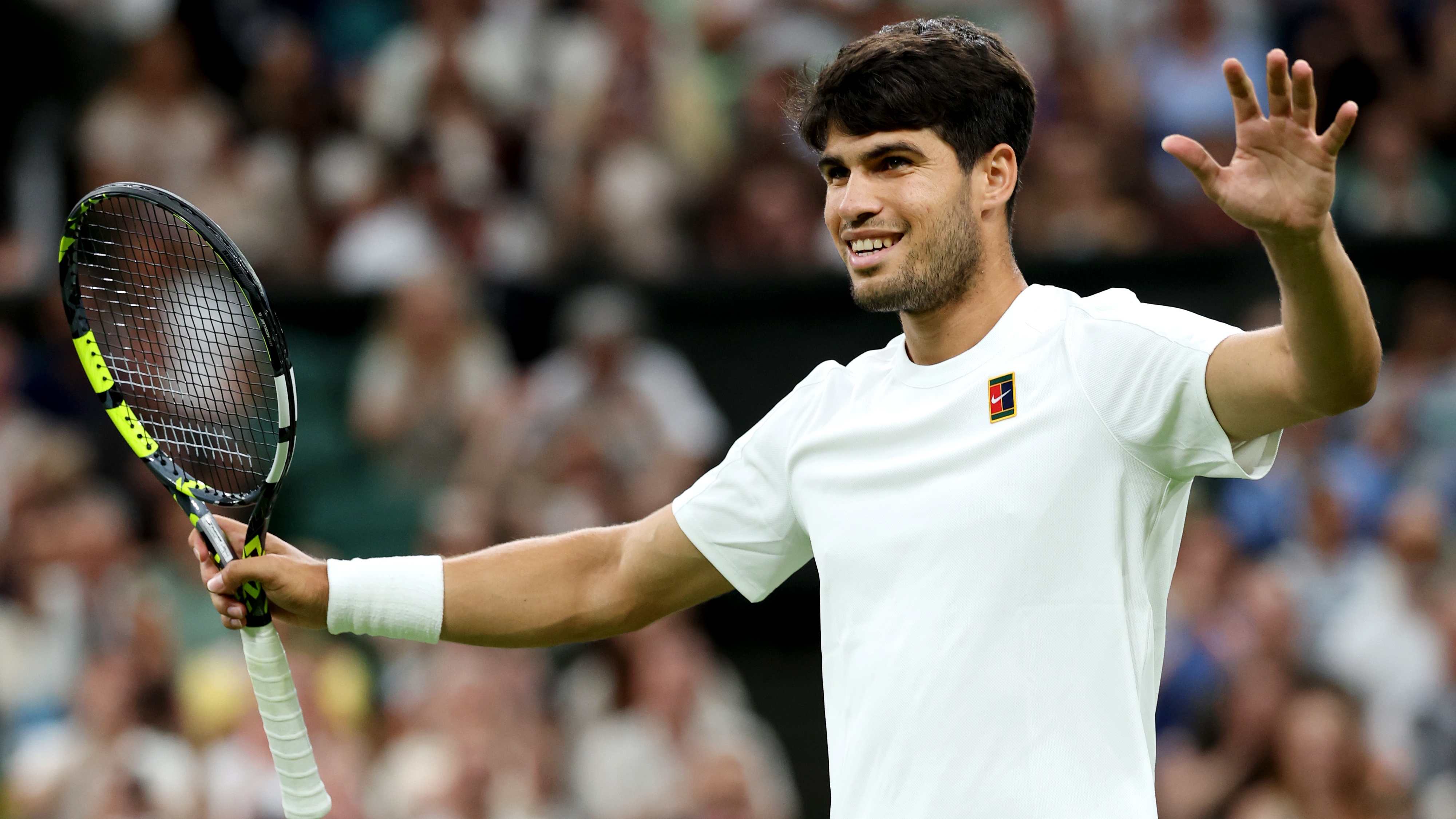 Carlos Alcaraz of Spain celebrates winning match point against Andrey Rublev during the Gentlemen's Singles fourth round match on day seven of The Championships Wimbledon 2025