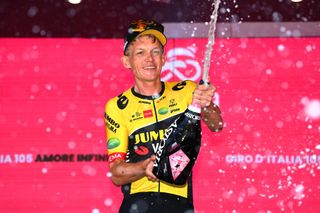 SANTUARIO DI CASTELMONTE ITALY MAY 27 Koen Bouwman of Netherlands and Team Jumbo Visma celebrates at podium as stage winner during the 105th Giro dItalia 2022 Stage 19 a 178km stage from Marano Lagunare to Santuario di Castelmonte 577m Giro WorldTour on May 27 2022 in Santuario di Castelmonte Italy Photo by Tim de WaeleGetty Images