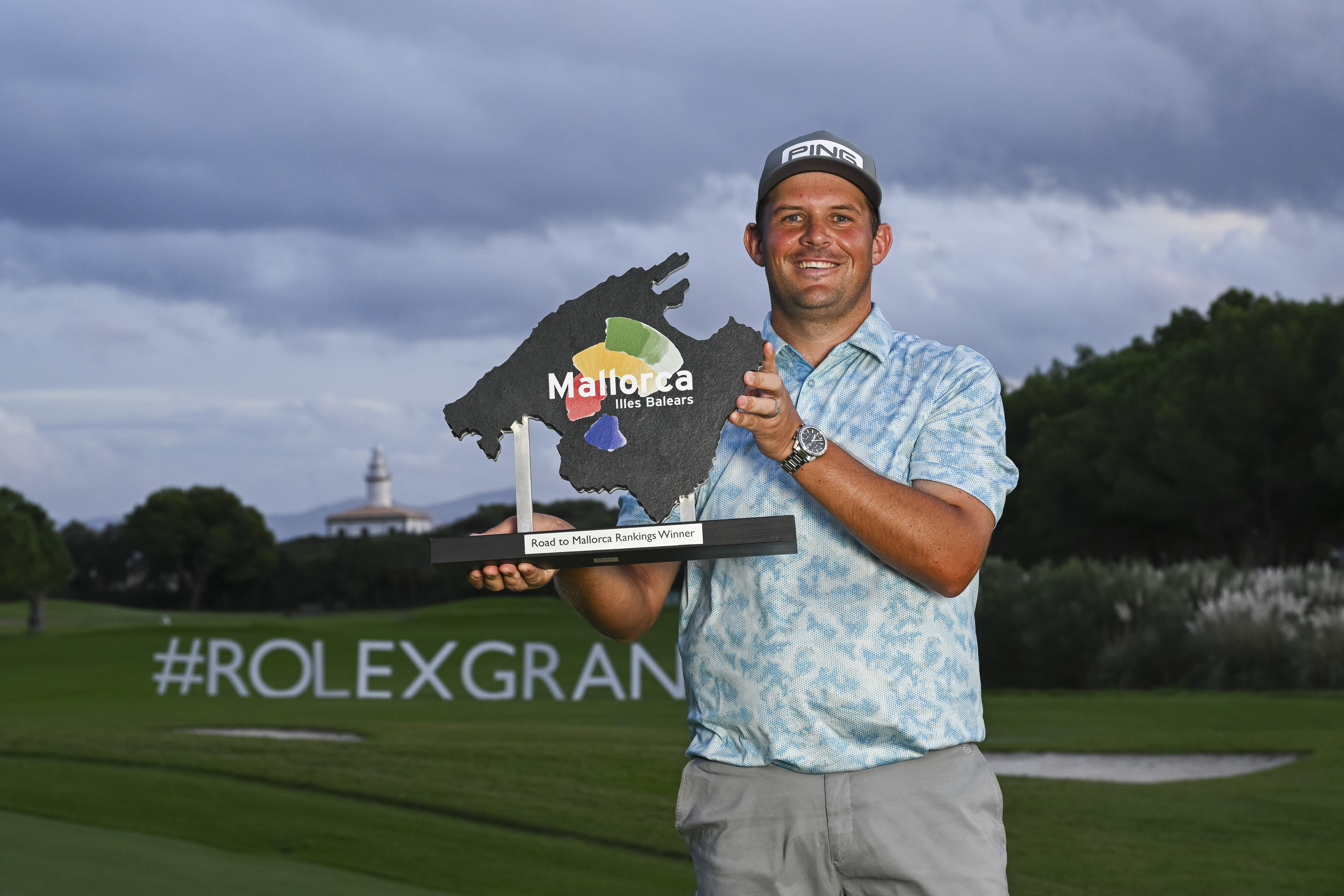 JC Ritchie poses with the Road To Mallorca trophy at the Rolex Grand Final 2025