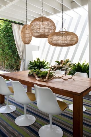 A pergola with a curtain rail for added shade