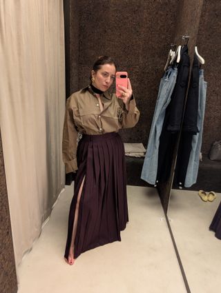 trying on Frankie Shop pleated skirt and shirt