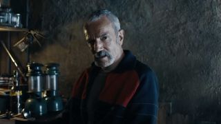 Daniel Day-Lewis wearing a blue and red shirt, as he appears in his new movie, Anemone (2025).