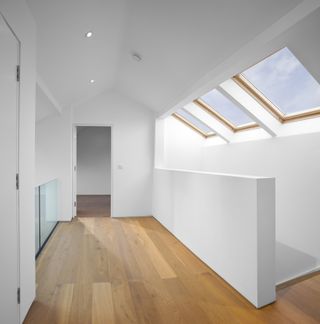 Rooflights flooding interior corridor with natural light
