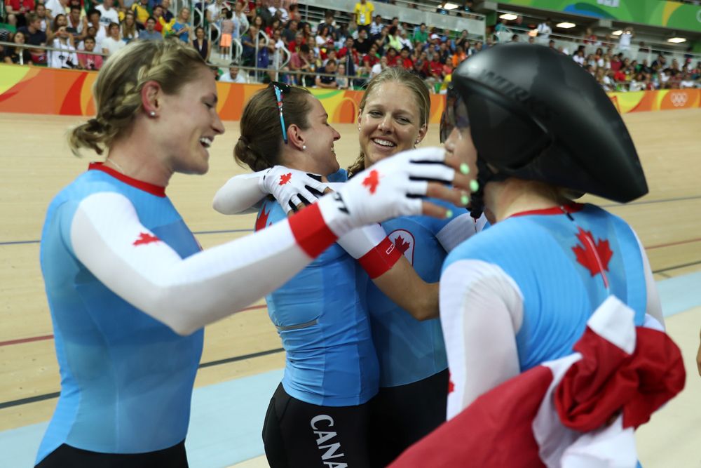 Canada enjoy their bronze medal win in the team pursuit
