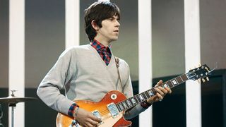 English guitarist Keith Richards of rock group The Rolling Stones plays a Gibson Les Paul guitar with Bigsby Vibrato on the set of the ABC Television pop music television show Thank Your Lucky Stars at Alpha Television Studios in Birmingham, England on 21st March 1965