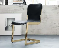 Lenny Kravitz x CB2 Rake Brass Chair for $399, &nbsp;at CB2