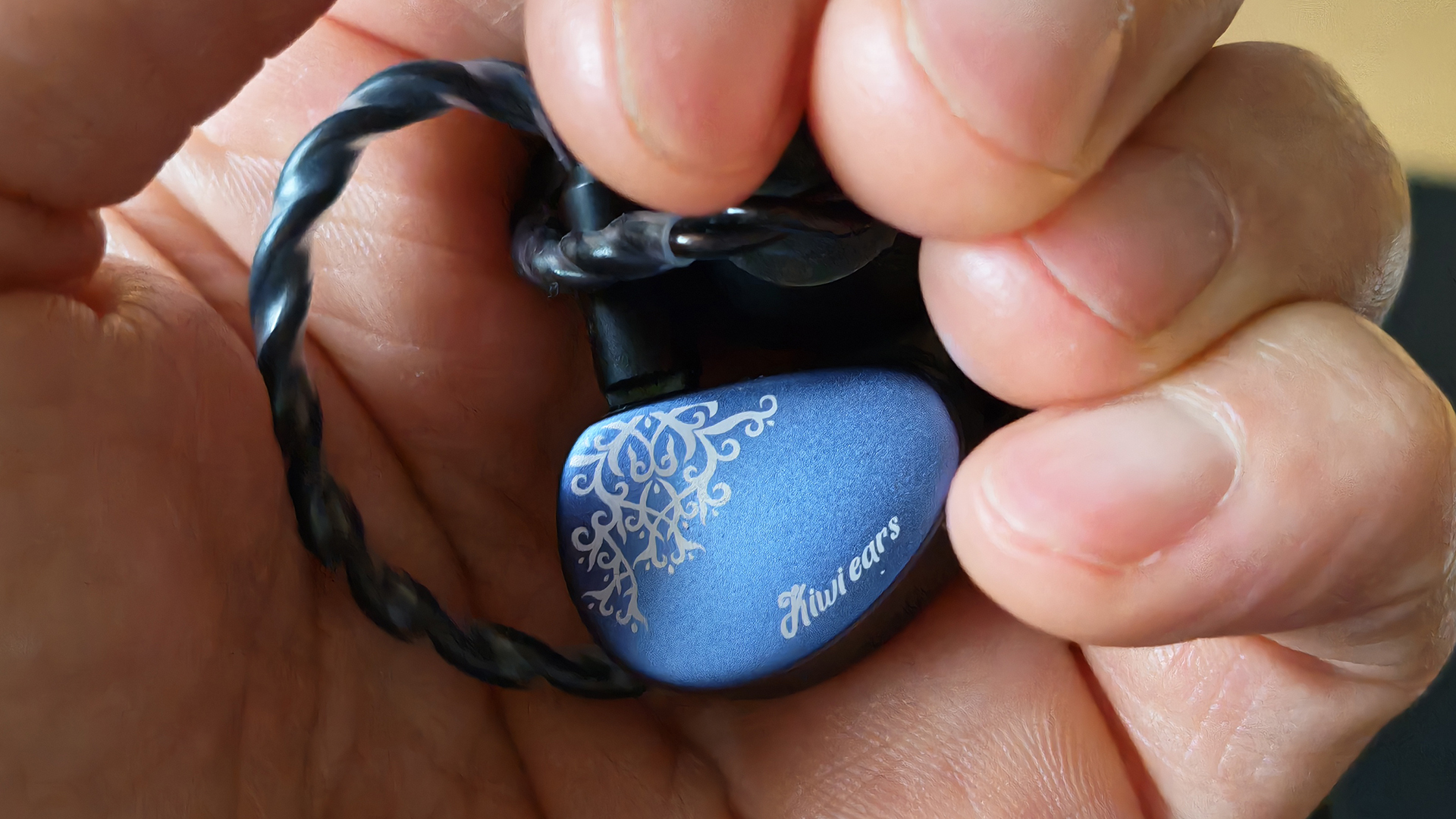 Various photos of the Kiwi Ears Cadenza II IEM. 
