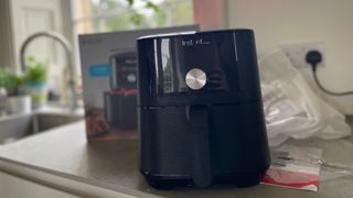 Instant 4-in-1 Air Fryer unboxed on the counter