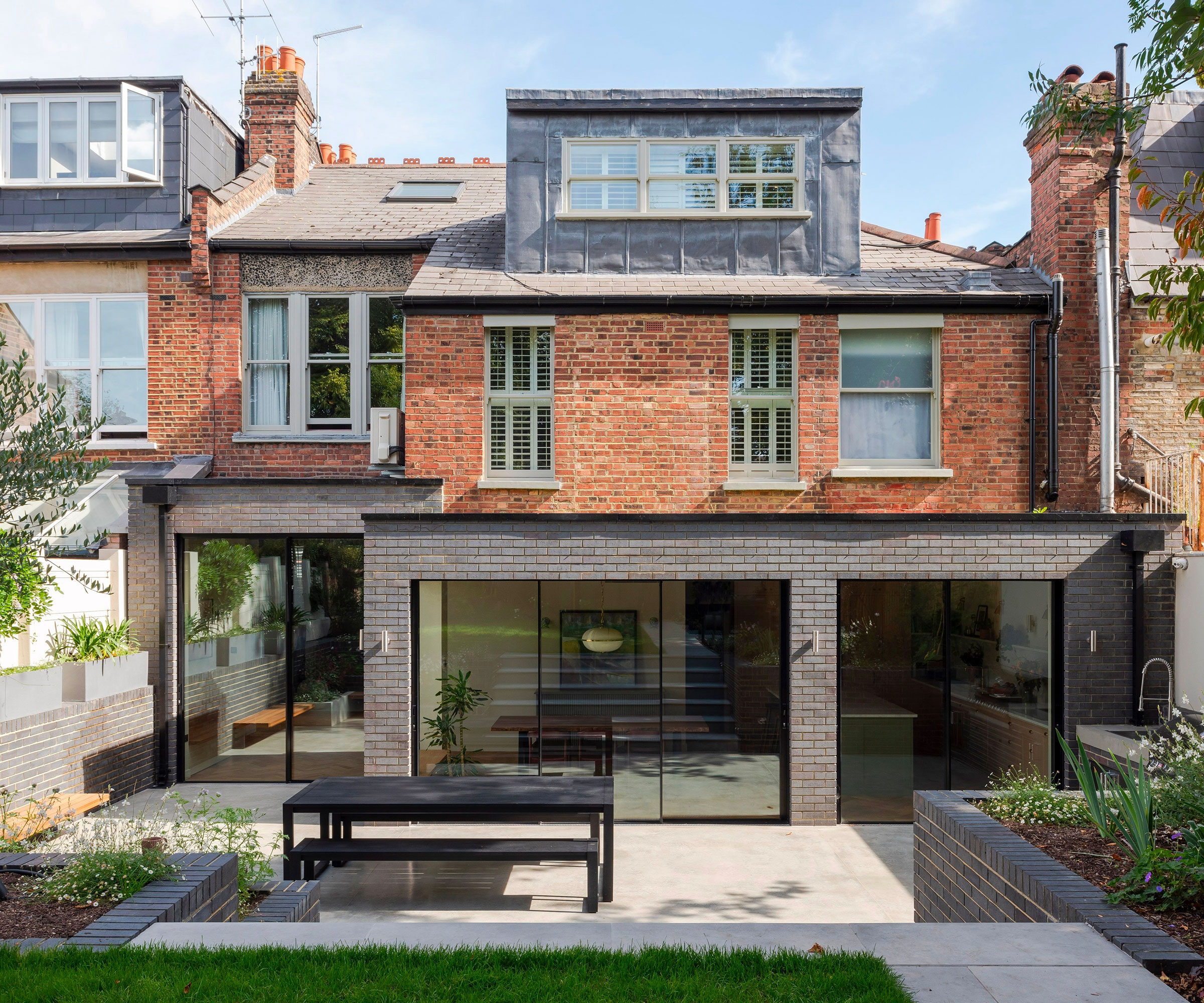 blue brick wrap around extension to Victorian terraced house