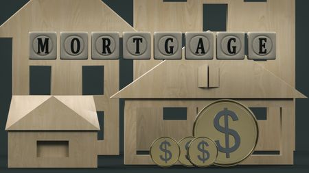 wooden cubes spelling out the word mortgage surrounded by wooden houses