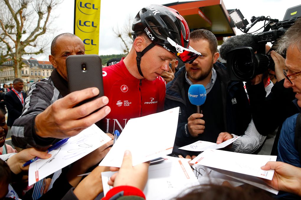 Chris Froome interatcs with fans at Criterium du Dauphine