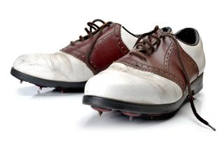 A picture of an old style golf shoe