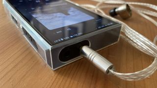 FiiO M23 on a wooden table