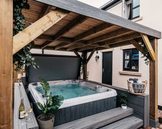 covered hot tub from North Spas