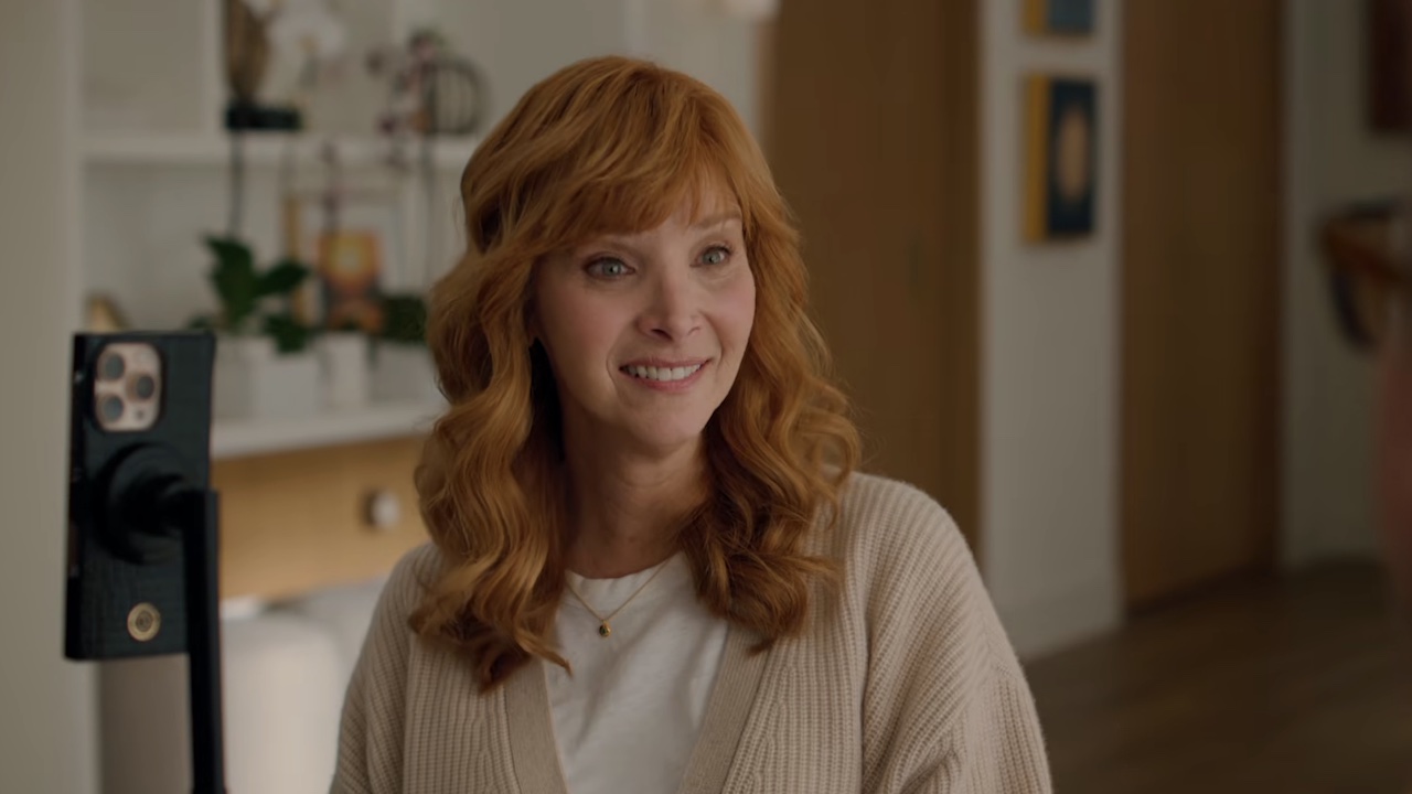 Valerie at home finding out her new show will be written by AI.