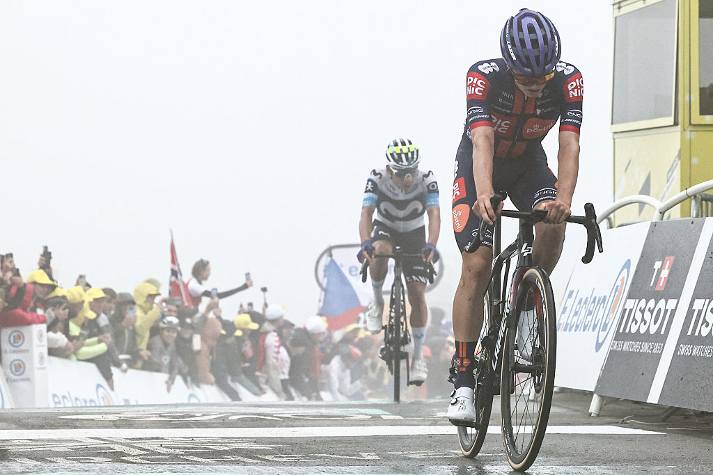 Team Picnic PostNL team's British rider Oscar Onley crosses the finish line of the 18th stage of the 112th edition of the Tour de France cycling race, 171.5 km between Vif and Courchevel Col de la Loze, in the Alps, southeastern France, on July 24, 2025. (Photo by Anne-Christine POUJOULAT / AFP)