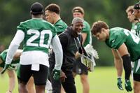 FLORHAM PARK, NEW JERSEY - JULY 29: Aaron Glenn head coach of the New York Jets greets players during training camp at Atlantic Health Jets Training Center on July 29, 2026 in Florham Park, New Jersey. (Photo by Adam Hunger/Getty Images)