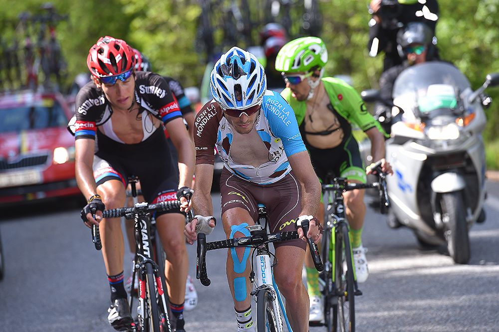 Hubert DuPont drives the early breakaway during stage 19