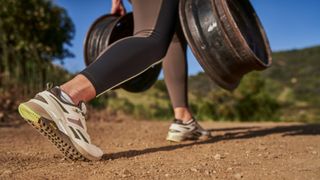 Woman working out wearing Reebok Nano X3 Adventure training shoes