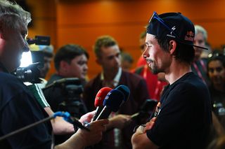 Primoz Roglic speaks to the members of the media at the Giro d'Italia opening press conference