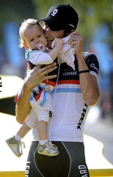 Frank Schleck with his child