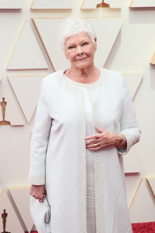 Dame Judi Dench has continued to act despite the hurdles from her health condition, earning an Oscar nomination in 2022