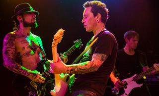 (from left) Dave Navarro, Billy Morrison and Chris Chaney perform with Camp Freddy at The Roxy Theatre in Los Angeles, California on December 31, 2013