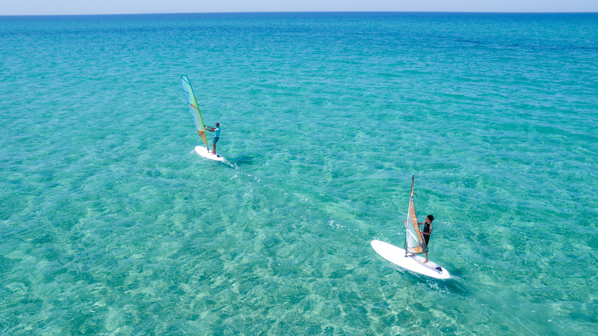 Paddleboarding in the sea at Hotel La Duna Bianca