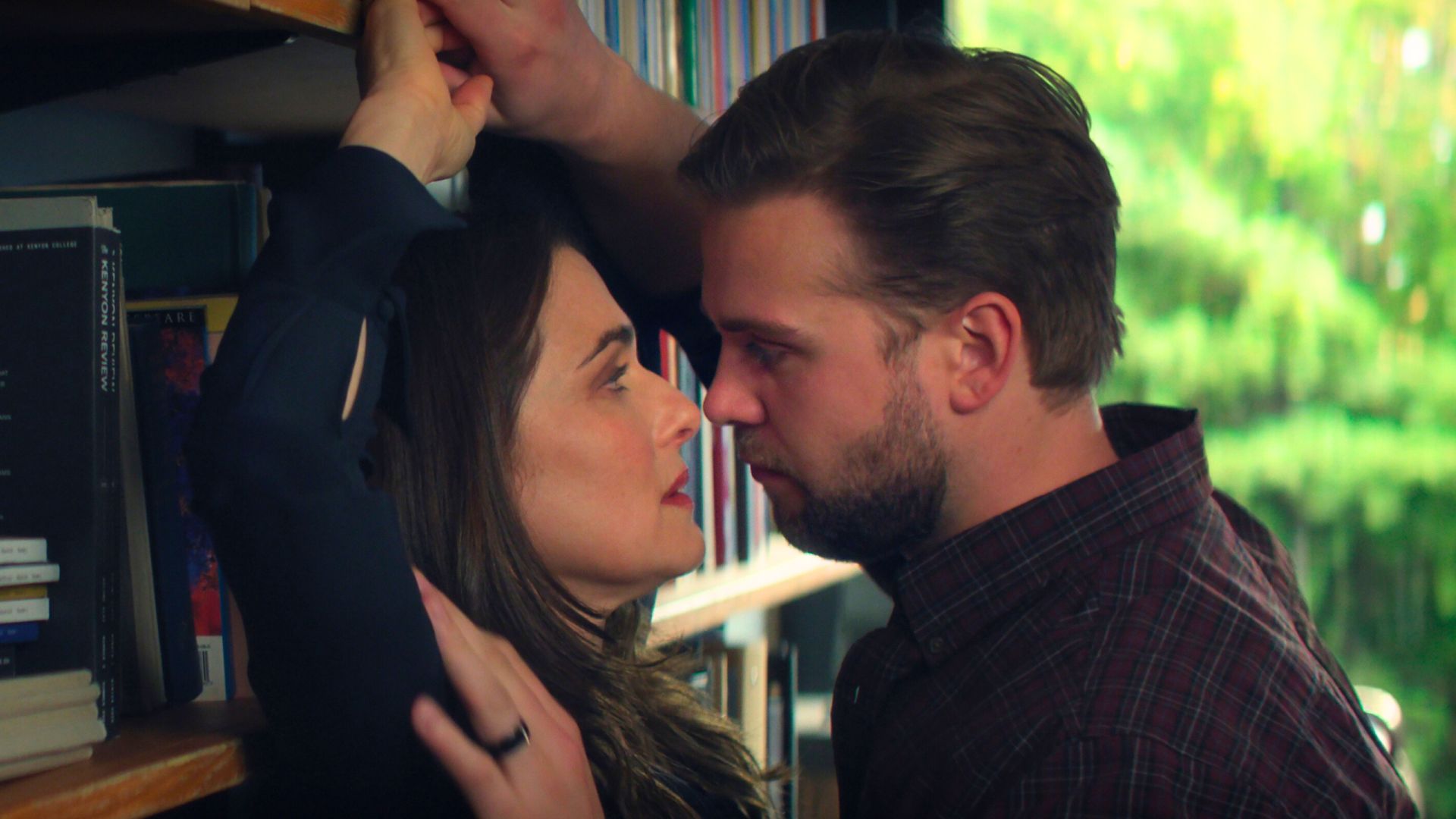 Leo Woodall pins Rachel Weisz to a bookcase